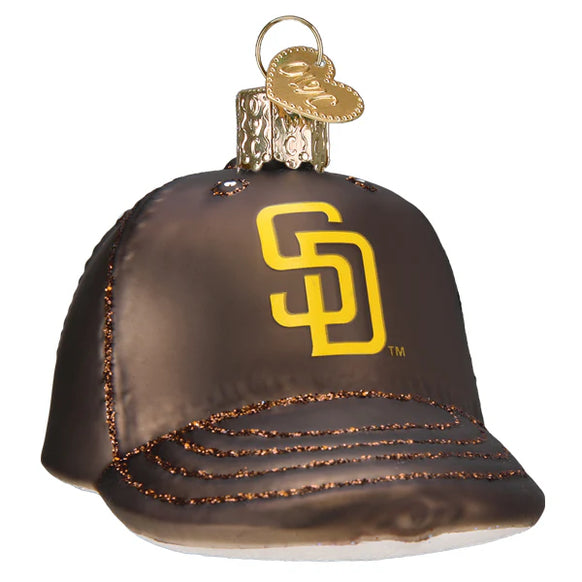 Glass ornament shaped like a baseball cap with a yellow San Diego Padres logo on a white background