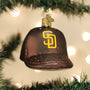 Decorative ornament shaped like a baseball cap with a Padres logo, hanging on a Christmas tree.