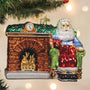 Santa sitting by a fireplace Ornament hanging from a tree - Old World Christmas  