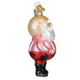 Glass ornament of a stylized Santa Claus figure on a white background
