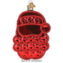 Decorative Christmas ornament shaped like a smiling Santa Claus popper on a white background. back of ornament
