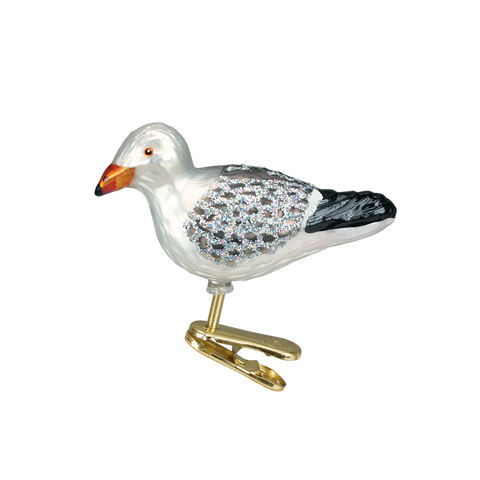 Decorative seagull ornament with a gold clip on a white background