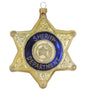 Front of Personalized Sheriff Badge Ornament with Sheriff Department wording, gold badge shape, blue center ring, and glittered star.
