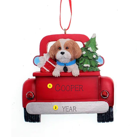 Decorative ornament of a Shih Tzu dog in a red truck can be personalized text on a white background.