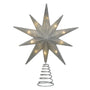 Lit 12" silver glitter star treetop with warm lights shining through the sparkling star design.