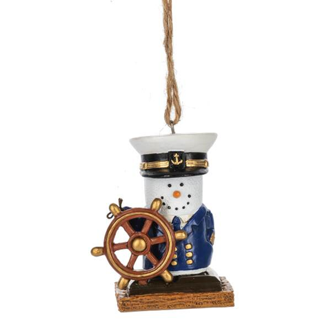 Nautical s'mores ornament with a marshmallow sailor captain, ship wheel, captain’s hat, blue jacket, and graham cracker base details.