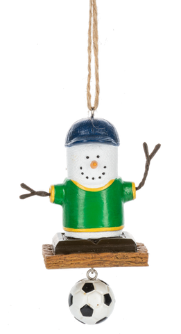 S’mores Soccer Fan ornament featuring a marshmallow character in a green shirt and navy cap with a dangling soccer ball accent.