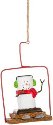 Whimsical ski lift ornament with a s'mores snowman, graham cracker details, twig arms, and festive winter accessories.
