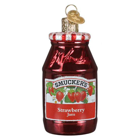 Red glass jar ornament with Smucker's Strawberry Jam label on a white background