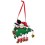 Snowman couple ornament with two smiling snowmen peeking over a decorated Christmas tree with dangling legs and space for a short phrase or name and year.