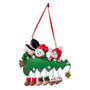 Snowman family of 3 ornament with three smiling snowmen peeking over a decorated Christmas tree with dangling legs and space for a family name or short phrase and year.