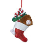 Sports stocking ornament with red glitter stocking, white cuff, candy canes, greenery, and a baseball glove with ball.