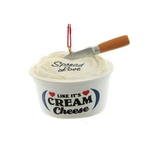Cream cheese tub ornament with the phrases “Spread Love” and “Like It’s Cream Cheese,” topped with a small spreading knife.