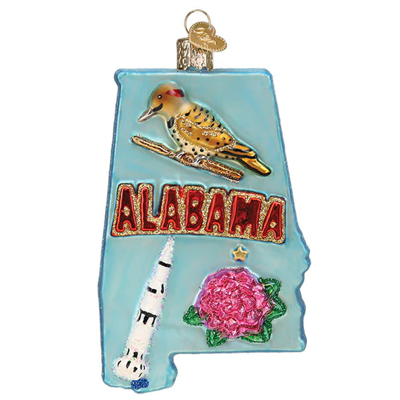 Decorative ornament shaped like the state of Alabama with a woodpecker, rocket, and rose.