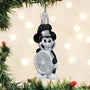 Decorative ornament shaped like Steamboat Willie Skipper with a top hat on a white background on tree