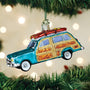 Decorative ornament of a vintage car with surfboard on a Christmas tree.