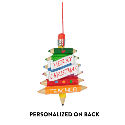A Christmas ornament shaped like a stack of colored pencils, with a red hanging string and the words 'MERRY CHRISTMAS' and 'TEACHER' on the front. Black text below reads 'PERSONALIZED ON BACK' on a plain white background.