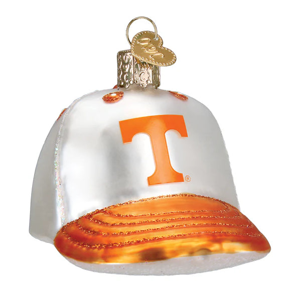 Glass ornament shaped like a baseball cap with an orange 'T' logo on a white background