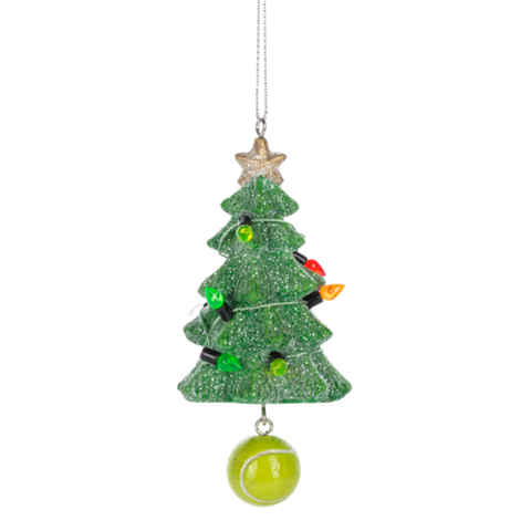 A green glitter Christmas tree ornament with colorful string lights and a hanging tennis ball at the bottom, suspended by a thin silver string against a white background.