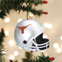 Decorative football helmet ornament with Texas Longhorns logo on a Christmas tree.