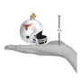 Glass football helmet ornament with Texas Longhorns logo on a white background, shown with a hand for scale.