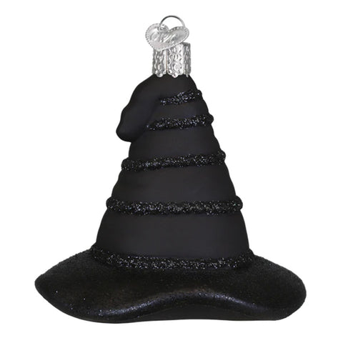 Black witch hat ornament with glittery details on a white background