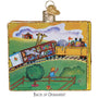 Glass Ornament Book titled 'The Little Engine That Could' by Watty Piper with colorful illustration on back cover 