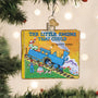 Decorative ornament of 'The Little Engine That Could' book hanging on a Christmas tree.