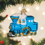 The Little Engine that Could Blue train ornament with gold accents on a tree