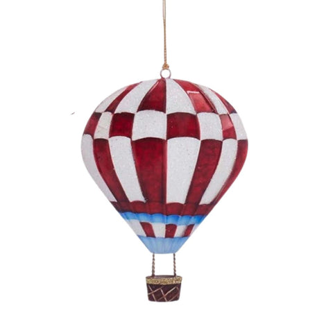 Tin hot air balloon ornament with red and white checkered panels, a blue accent band, and a small hanging basket.