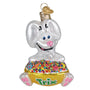 Glass ornament of a Trix rabbit on a box of Trix cereal with a white background