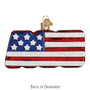 Glass ornament with American flag design on a white background back of ornament