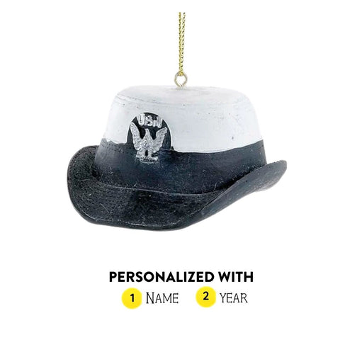Personalized U.S. Navy women’s enlisted hat ornament with black brim, white top, emblem detail, and gold hanging cord.