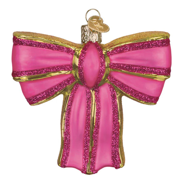 Pink bow ornament with gold accents on a white background