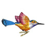 Colorful glass hummingbird ornament on a white background
