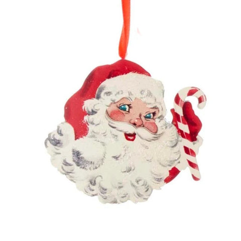 Vintage-style Santa face ornament with rosy cheeks, red hat, white beard, and a red and white striped candy cane held at the side.