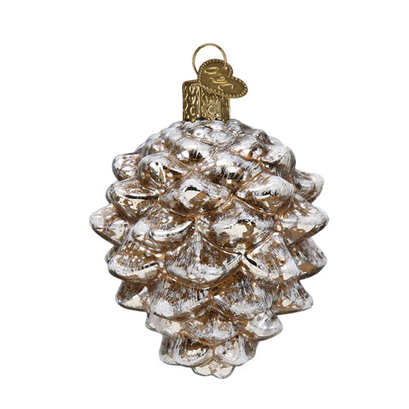 Decorative glass pine cone ornament on a white background
