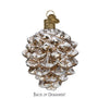 Decorative glass pine cone ornament on a white background back view