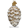Decorative glass pine cone ornament with gold accents on a white background