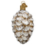 Decorative glass pine cone ornament on a white background