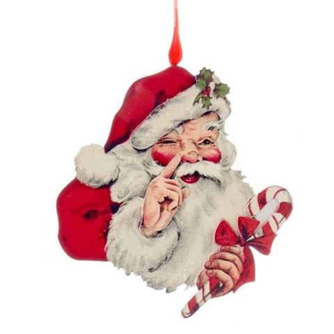 Vintage-style Santa face ornament with one eye winking, rosy cheeks, red hat, white beard, and a red and white striped candy cane.