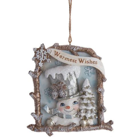 Snowman ornament in a rustic twig-style frame with snowy trees, blue background accents, and a Warmest Wishes banner across the top.