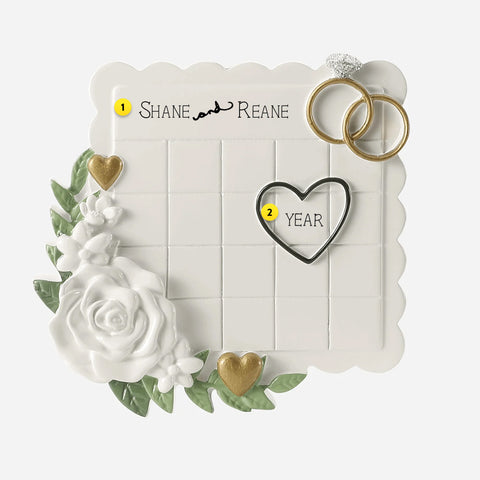 Wedding Calendar Keepsake ornament decorated with rings, heart and rose. Can be personalized.