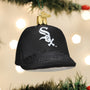 Black baseball cap ornament with a White Sox logo on a Christmas tree