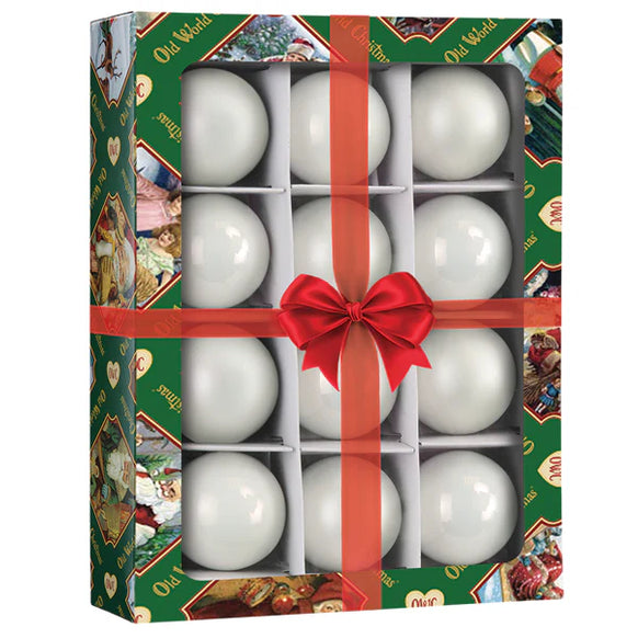 Boxed Old World Christmas Wonderland Balls 12-count ornament set with 1.5" mini white round ornaments in a festive green gift-style package.
