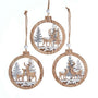 Round wooden reindeer ornaments in three layered woodland styles with trees, snowy accents, and rustic hanging cords.