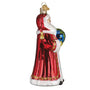 Decorative glass ornament of a Santa in a red outfit with a white beard, holding a colorful bag on a white background.