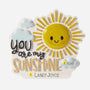 Decorative Ornament with a sun design and 'You are my sunshine' text on a white back round