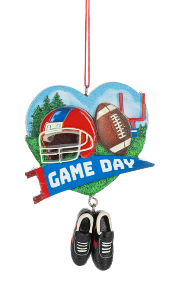 Heart-shaped football ornament with a helmet, football, goalpost, blue “Game Day” banner, and dangling black cleats.