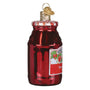 Red glass jar ornament with a label on a white background